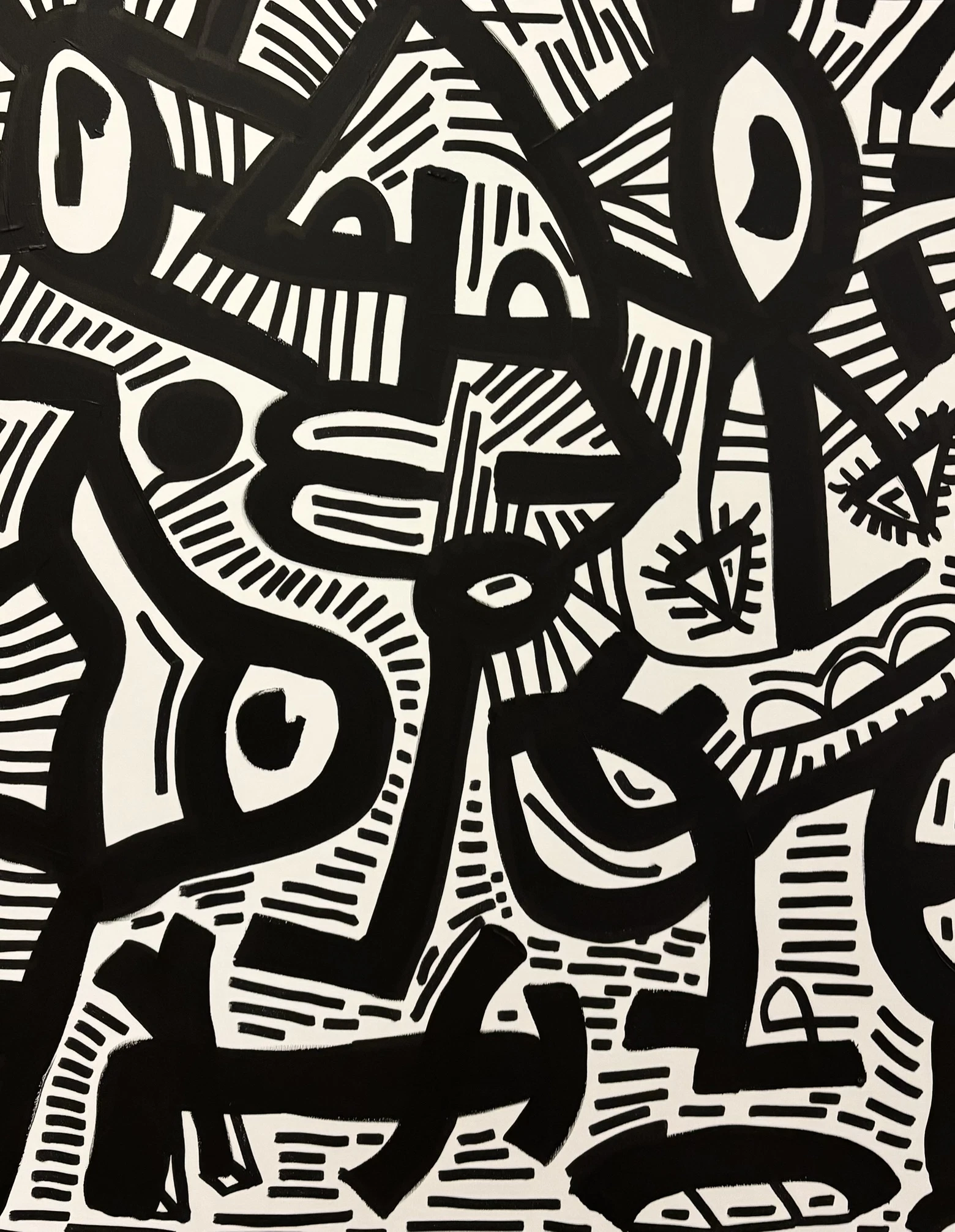 Composición vertical de gruesos trazos negros sobre blanco, con ojos, formas triangulares y franjas de rayas cortas entre las líneas. Sin título. Acrílico sobre lienzo, 70 x 90 cm, 2026. Madrid. Nicolás Lapadula