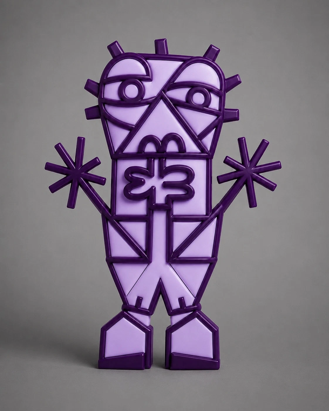 Figura erguida de bloques en dos tonos de morado, con rostro geométrico, brazos en forma de estrella y pies cuadrados, sobre fondo gris. Tótem. Impresión 3D, 24 x 10 x 3 cm, 2026. Caracas. Nicolás Lapadula